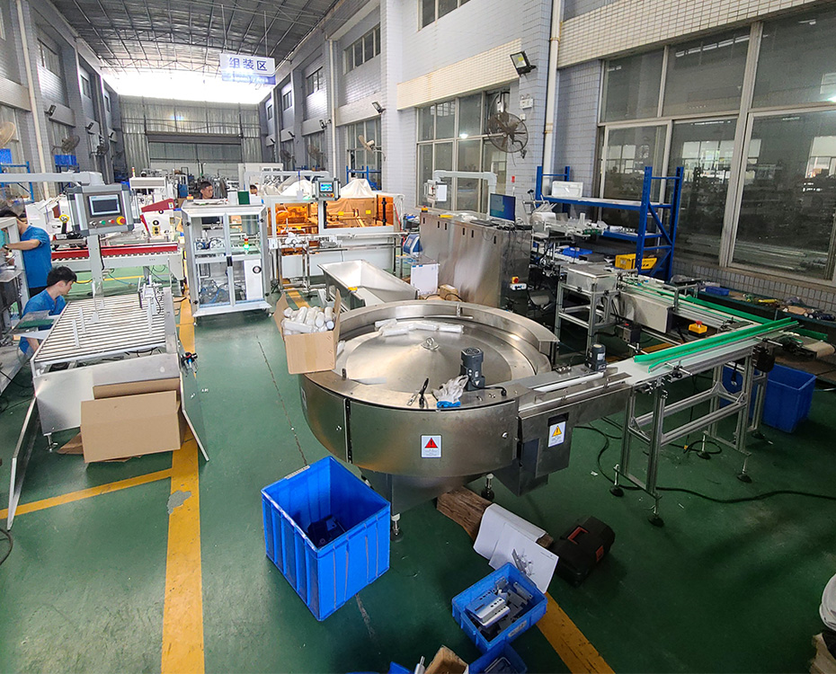 离心转盘自动理料、装盒、装箱、封箱包装线